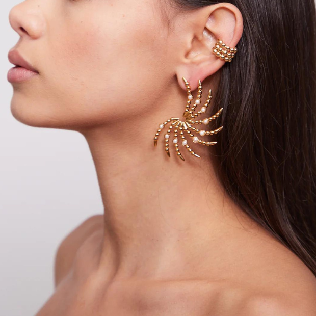 Stylish small ear cuffs with a contemporary edge, making a subtle yet impactful statement.