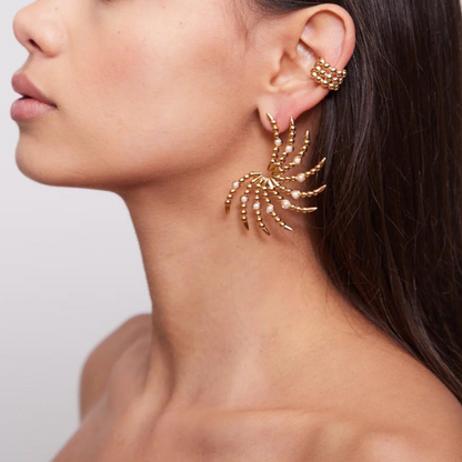 Stylish small ear cuffs with a contemporary edge, making a subtle yet impactful statement.