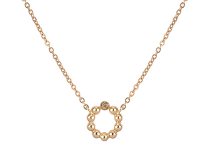Unique gold chain necklace with a modern twist, providing a chic and timeless accessory.
