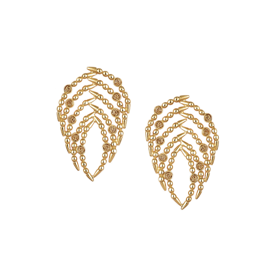 Statement handmade gold earrings with a texture and striking silhouette.