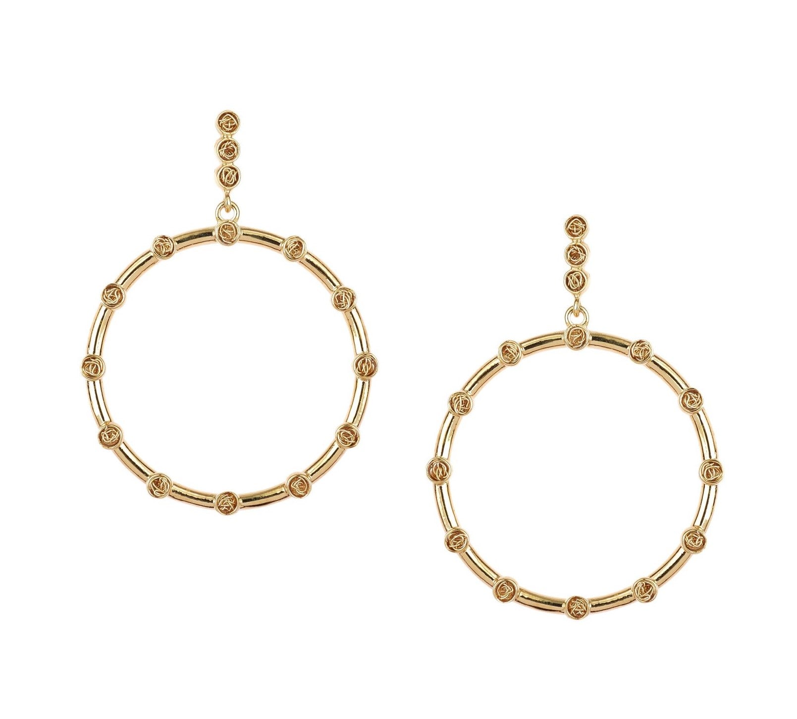 Unique statement gold hoop earrings showcasing a modern silhouette and a touch of artisanal crochet artistry.