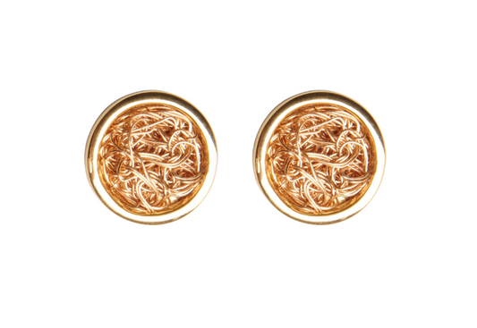 Artisan-crafted stud earrings with crochet details, offering a distinctive and versatile accessory.